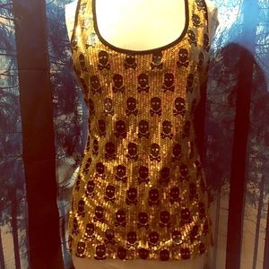 Gold sequin blouse with black skulls